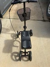Bodymed Folding Knee Walker With White Soft Pad Cover. Fixed Price $50.00.