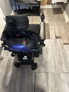 Quantum Level Electric Wheel Chair. Fixed Price $2000.00.