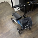 Bless Reach Economy Knee Scooter, Steerable Walker, Foldable Black. Fixed Price $65.00.