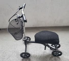 Medline Four Wheeled Kneewalker Model # MDS86000G4 (used). Fixed Price $80.00.