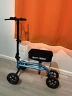 Kneerover Steerable Economy Scooter With Dual Braking System Metallic. Fixed Price $140.00.