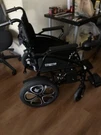 Comfy Go 6011 Electric Wheelchair With Charger. Fixed Price $550.00.