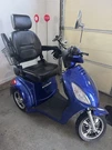 Ewheels Blue Electric 3-WHEELED Scooter W/ Rear View Mirror & Storage. Fixed Price $800.00.