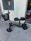 New Roscoe Medical Knee Scooter 4 Wheels, Black In Condition. Fixed Price $60.00.