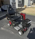 Golden Technologies Buzzaround Lx 4-WHEEL Scooter Swivel Seat Black/red. Fixed Price $1900.00.