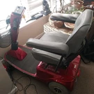 Pride Celebrity 3-WHEELED Red Mobility Scooter With Storage Compartment. Fixed Price $700.00.