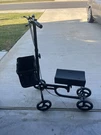 Homcom Knee 4-WHEELED Scooter Blue. Fixed Price $100.00.