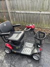 Golden Buzzaround Extreme 4-WHEEL Scooter Black/red. MODEL#GB148EX. Fixed Price $600.00.