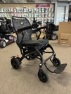 Golden Cricket GP302 Foldable Power Chair With Lightweight Carbon Fiber Frame. Fixed Price $2899.00.
