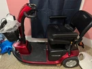 Pride Victory 10 4-WHEEL Mobility Scooter Red, Padded Armrest, Removable Basket. Fixed Price $800.00.